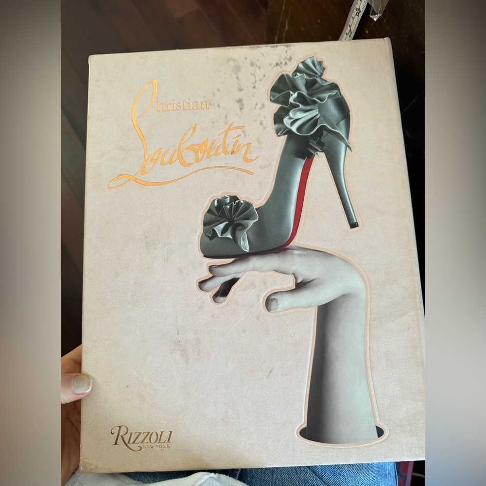 First Edition 2011 Louboutin Hardcover, never opened, cover dings